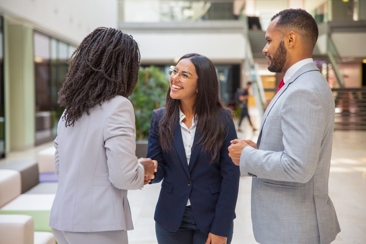 How to sell a business quickly: professionals shaking hands
