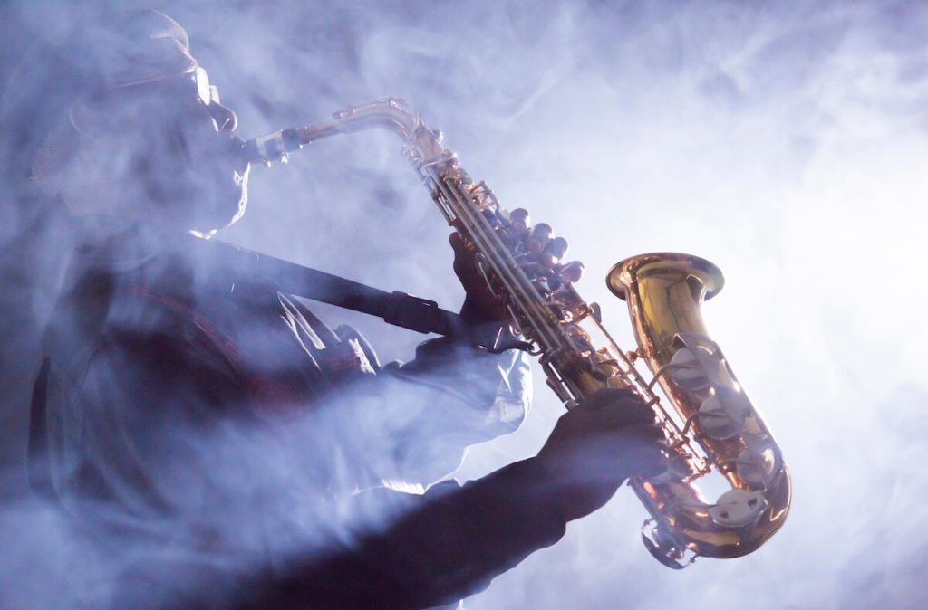 Small business valuation: person playing a saxophone