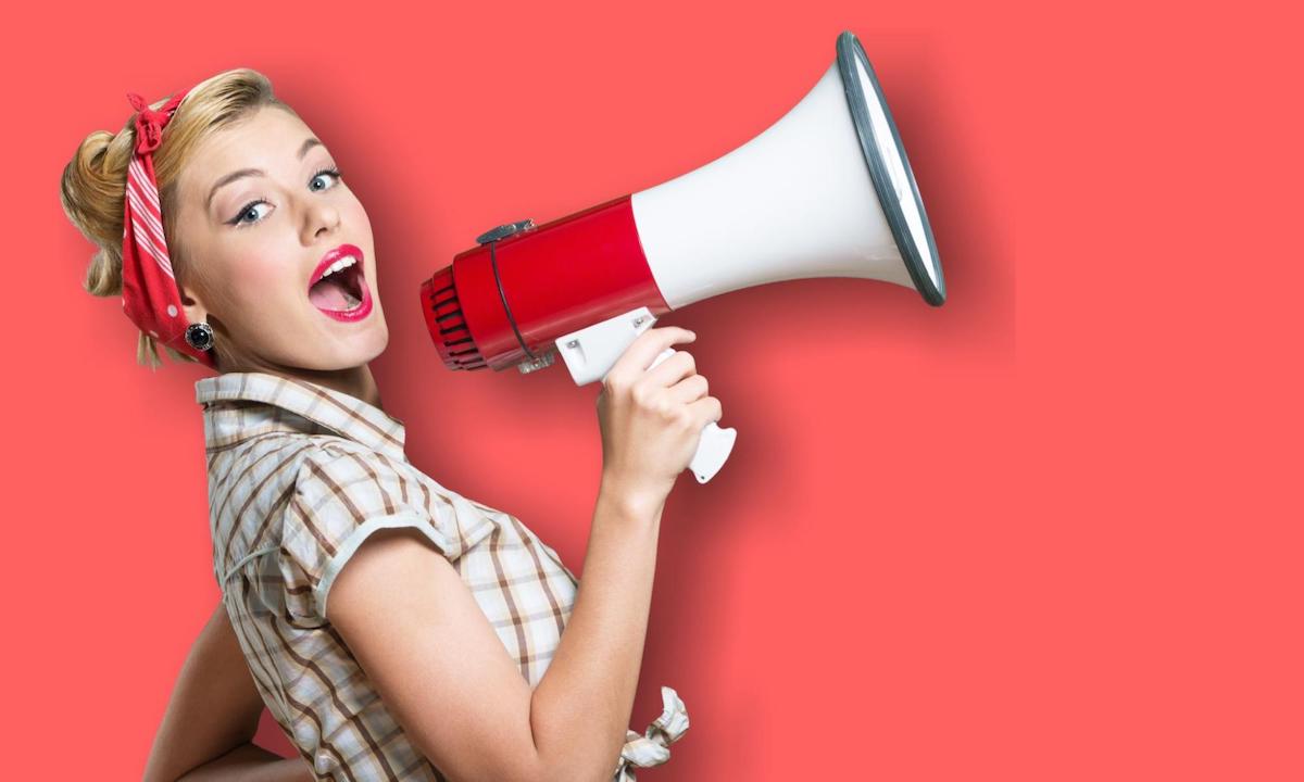 How to market a business for sale: woman using a megaphone